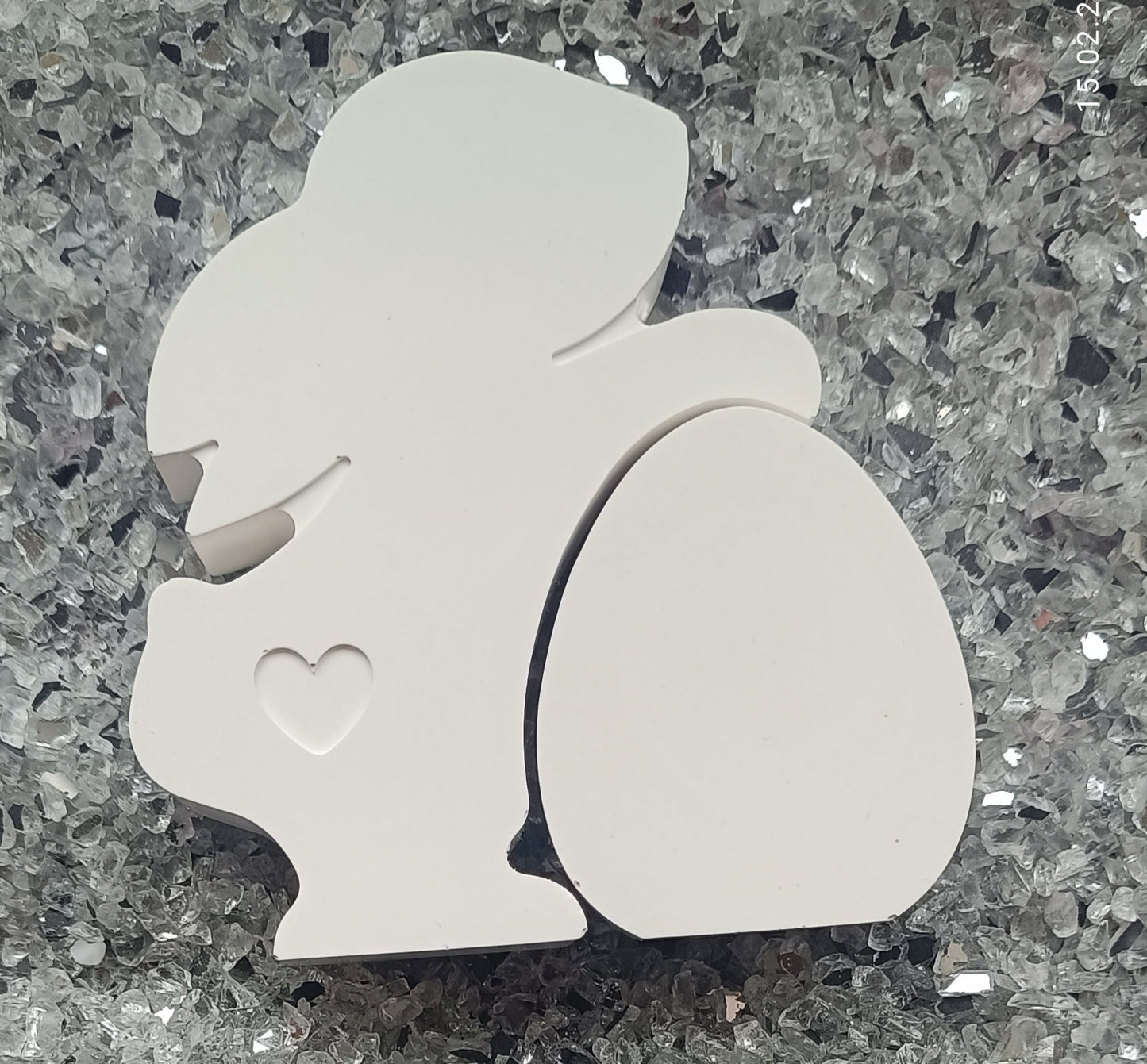 Hase mit Ei H=10cm B=9cm