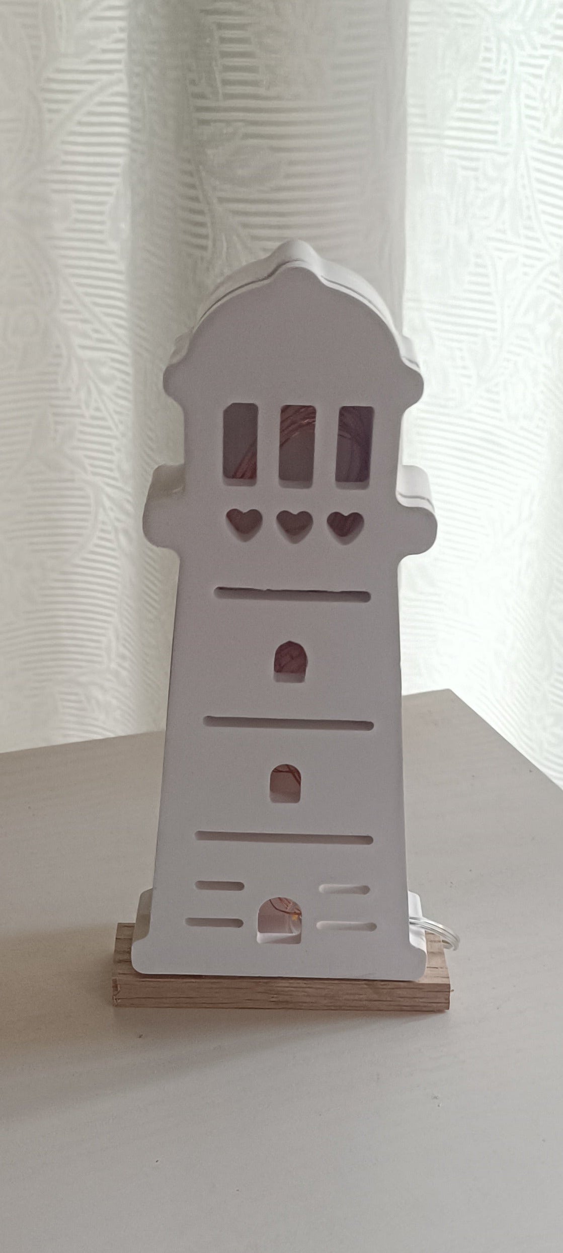 Leuchtturm auf Holzsockel